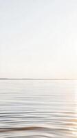 Peaceful Water Horizon A Serene Minimalist Landscape Capturing Gentle Ripples and Soft Light, Ideal for Calm and Contemplative Ambiance photo