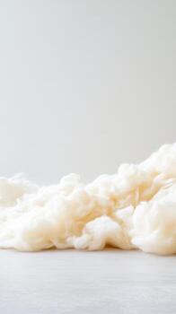 Soft, Fluffy White Texture Background A Gentle Pile of Natural Fiber, Ideal for Serene and Clean Design Projects or Textile Concepts photo