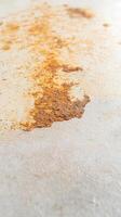 Captivating close-up of vibrant orange and brown rust texture, showcasing intricate patterns of natural corrosion on an aged metal surface, perfect for industrial backgrounds photo