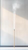 Serene Incense Smoke Rising A Symbol of Calm, Meditation, and Spiritual Purity in a Minimalist Setting. Perfect for Wellness and Zen Concepts photo
