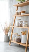Modern Kitchen Pantry with Organized Food Storage Jars on a Wooden Shelf, Showcasing Natural Light and Minimalist Home Decor for Healthy Living. photo