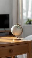 Vintage Globe on Wooden Table Bathed in Sunlight, Evoking Wanderlust and Global Exploration. Perfect for Travel, Education, and Home Decor Concepts. photo