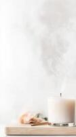 Serene White Candle with Wisps of Smoke on a Wooden Board, Evoking a Calm and Peaceful Ambiance for Relaxation and Wellness photo