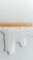 Vibrant Golden Soap Bar with Pristine White Lather on a Clean Surface, Capturing the Essence of Freshness and Daily Hygiene Routines photo