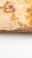 Captivating close-up of rich, textured rust on aged metal, revealing intricate patterns of corrosion and decay. A perfect grunge background or abstract art element. photo