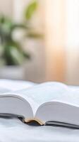 Immersive Reading Experience An Open Book Bathed in Gentle Light, Symbolizing Knowledge, Quiet Study, and Intellectual Pursuit photo