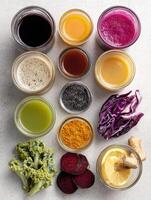 Organic Juice Ingredients Beautifully Arranged on a Clear Surface for Healthy Beverage Preparation photo