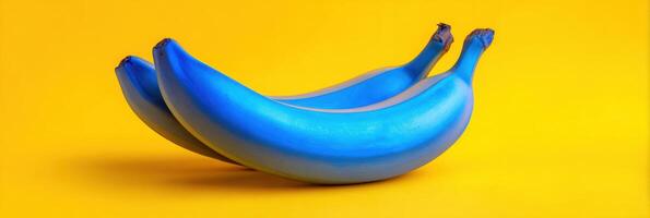 Visual Contrast of Blue Bananas Set Against a Vibrant Yellow Background Exploring Surreal Concepts in a Playful and Imaginative Setting photo