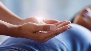 Hands gently holding space over a person photo
