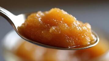 Honey on a spoon. photo