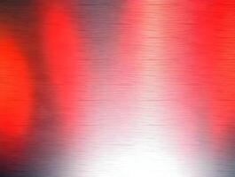A red and black background with a red light photo