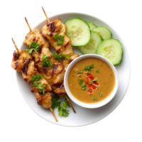 Grilled chicken skewers with peanut sauce and cucumber slices a delicious meal png