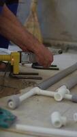 Plumber Working with Plastic Pipe Welding Tool video