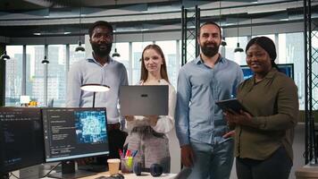 Portrait of smiling teamworking programmers utilizing AI to optimize performance and forecast issues. Cheerful coworkers in office training machine learning models, camera A video