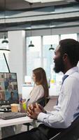 Vertical Tech startup office team collaborating via videocall, doing brainstorming on backup solutions to protect against data loss. Remote developers doing AI coding during online teleconference, camera A video