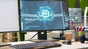 Close up of PC screen on startup office desk showing artificial intelligence programming languages. Computer in tech company workplace used for AI deep learning code testing and quality assurance video