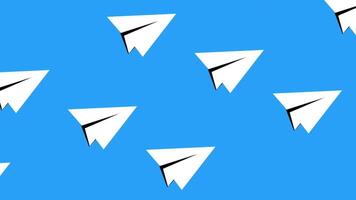Multiple paper planes flying across a blue background, representing communication, messages or collective ideas in motion video