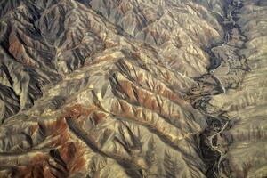 Aerial View of Brown and Gray Mountain Range photo