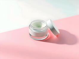 A jar of cream on a pink and white background photo