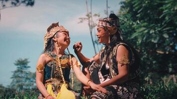 Happy Javanese Couple Laughing and Playing in a Forest video
