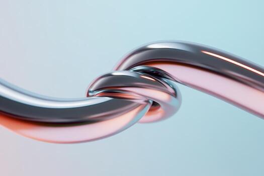 Close-up view of intertwined metallic chains showcasing strength and connection against a soft gradient background photo