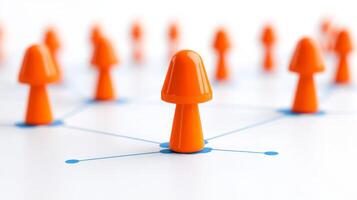 Colorful orange game pieces connected on a network grid symbolize strategy and collaboration in a playful environment photo