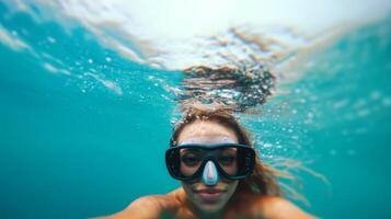 Underwater snorkeling adventure in crystal clear tropical waters capturing the essence of marine exploration and aquatic beauty photo