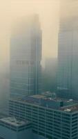 Aerial view Chicago on a foggy day. Cloudy morning in downtown Chicago Illinois. Tall skyscrapers and business centers of the central part of the city are video