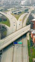 Flight over the interstate in the City of Chicago. Suburban car interchange and entrance to the city of Chicago. Traffic of arriving cars arriving in the city. video