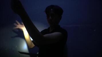 Eerie Flashlight Encounter in Dark Room video