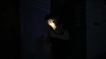 Contemplative Figure in Dim Light video