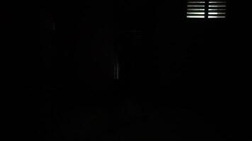 Child in Darkness with Light Source video