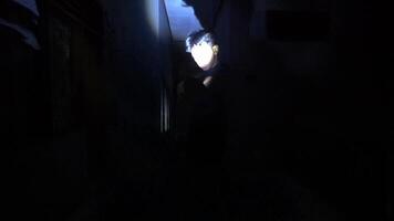 Mysterious Figure in Dark with Flashlight video