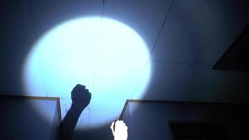 Illuminated Shadow of a Fist on Ceiling video