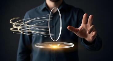 A man is holding a transparent object with a glowing light photo