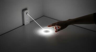 A person touching a light on a table photo