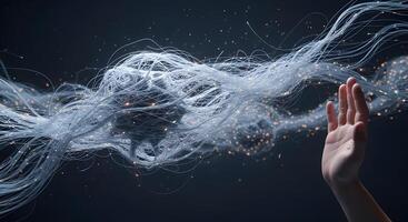 A hand reaching out to touch a cloud of white smoke photo