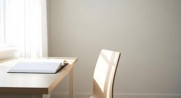 A chair and a desk in front of a window photo