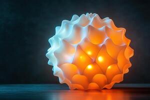 A white and orange lighted sphere on a table photo