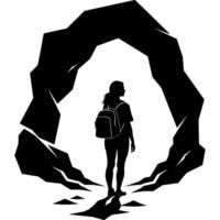 Girl tourist at entrance to a cave vector