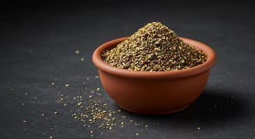Aromatic dry herb and seed blend in a rustic bowl, delicious for seasoning dishes. photo