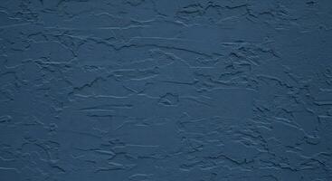 Detail of a deep blue textured wall, perfect for backgrounds and copy space. photo