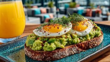 Avocado toast with fried eggs photo