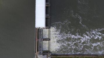 Aerial flyover of hydroelectric dam and fish pass facility Colwick England video