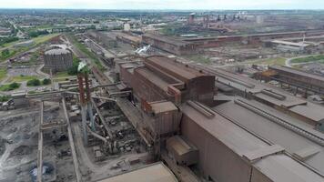 Industrial aerial footage of Scunthorpe steel furnaces and silos video