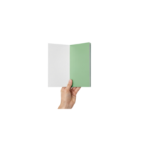 A hand holds an open booklet with white and green pages against a transparent png