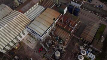 Aerial view of water purification and sewage filtration plant with storage silos in England video