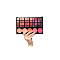 A hand holds a large makeup palette filled with various shades of eyeshadow and png