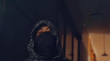 Mysterious Urban Portrait in Cloak and Mask video