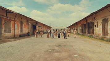 Group Walking Between Old Buildings video